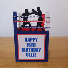 Load image into Gallery viewer, A card made to lok like a boxing ring with ropes and boxers. Can be personalised.