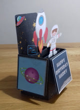 Load image into Gallery viewer, Space themed pop up box card with a rocket and astronaut