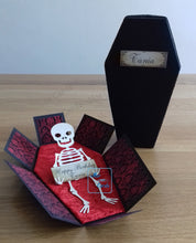 Load image into Gallery viewer, An exploding box card coffin with skeleton inside holding a personalised panel