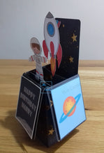 Load image into Gallery viewer, Space themed pop up box card with a rocket and astronaut