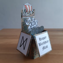 Load image into Gallery viewer, A pop up box card with a Viking, shields and a Viking boat