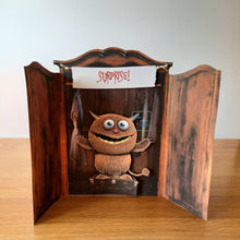 Load image into Gallery viewer, a closet wardrobe with a cute monster hiding inside waiting to surprise you